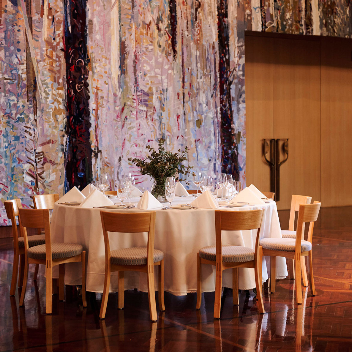 Round table set in the Great Hall